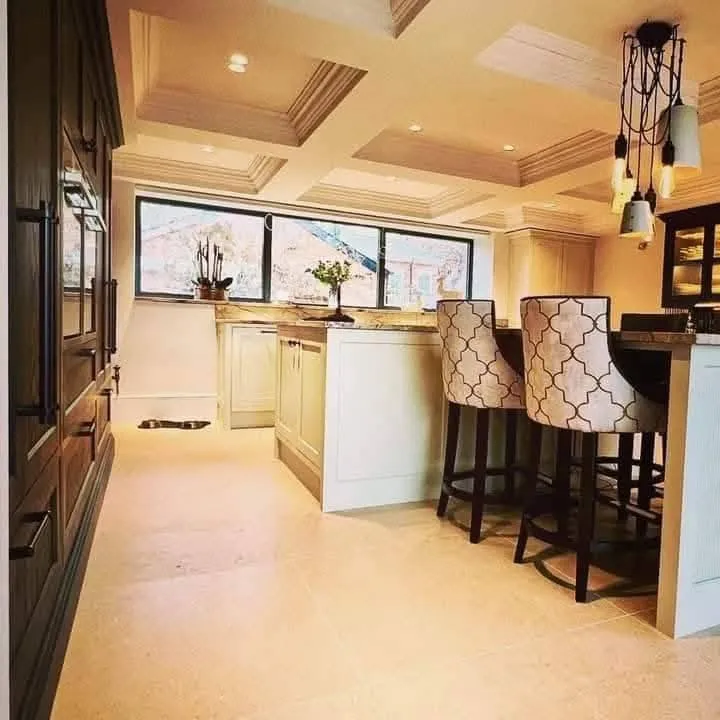 Finished kitchen with a decorative coffered plaster ceiling and recessed lighting